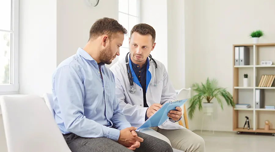 Doctor evaluating research on sodium, mineral balance, and blood pressure regulation