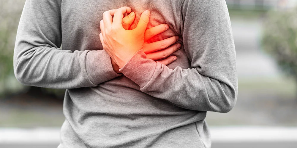 Functional medicine physician reviewing cardiovascular labs with a patient