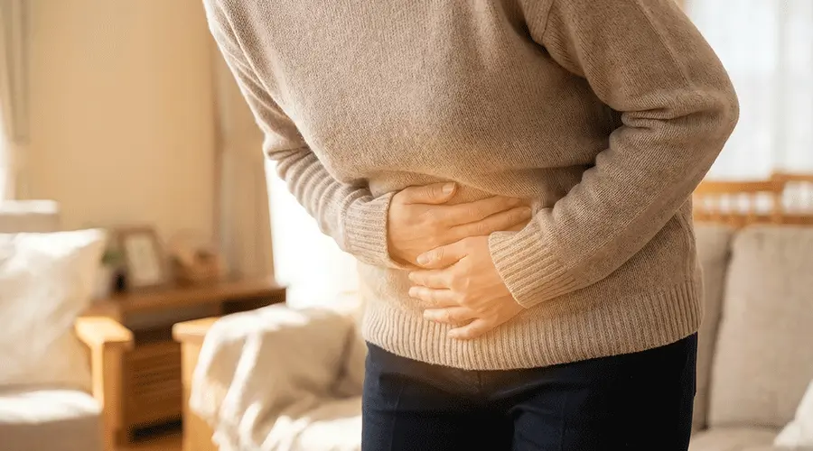A healthcare practitioner explaining comprehensive lab results to a female patient in a professional medical setting.