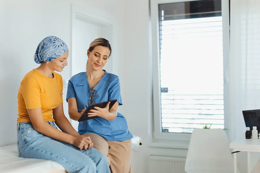 Illustration showing cancer cells and immune cells interacting within a personalized cancer care concept.