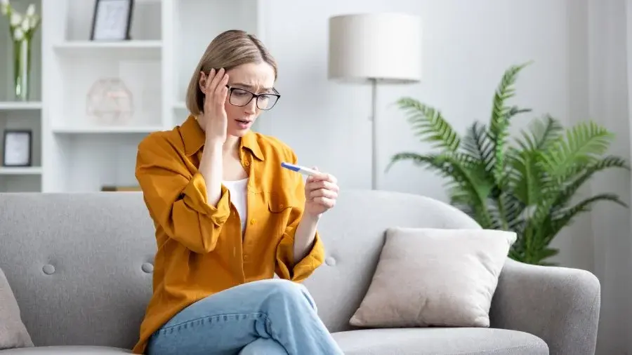 Woman discussing possible signs of infertility with a healthcare professional.