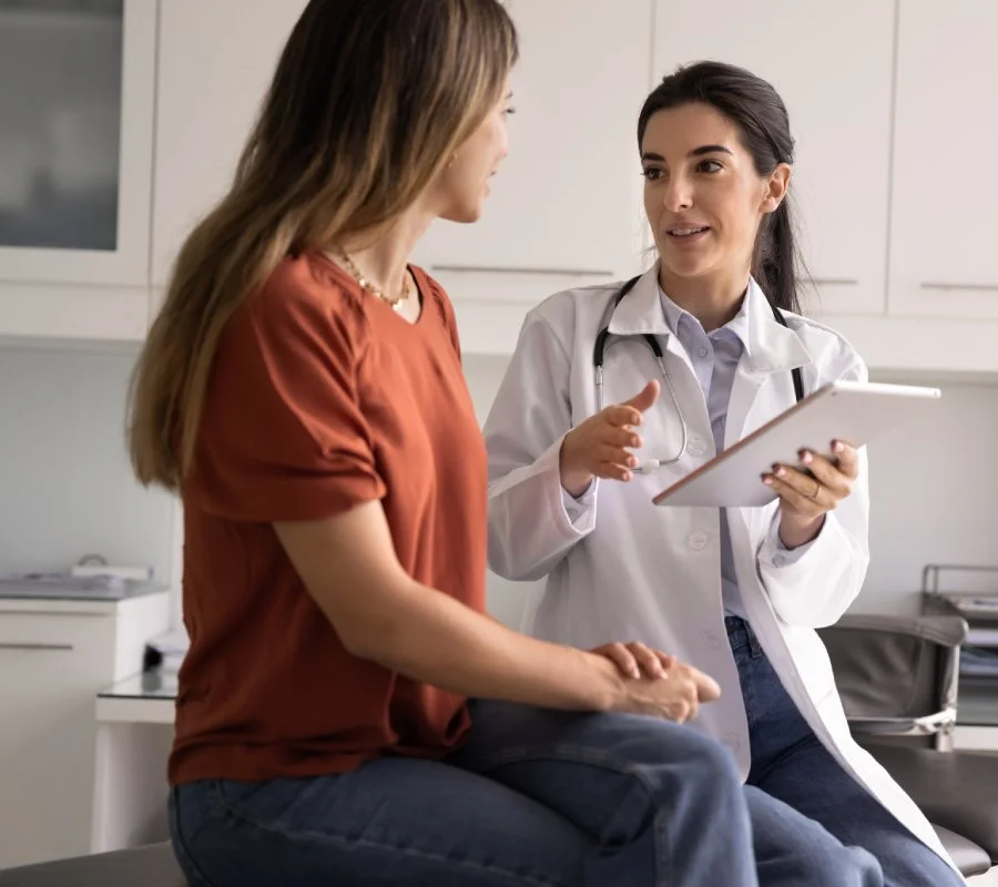 Woman discussing low libido concerns during a medical consultation.