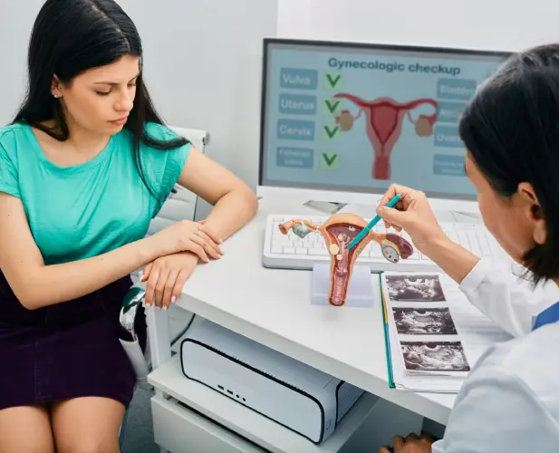  Physician discussing endometriosis care and treatment options with a patient